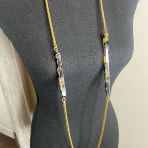 Long gold/tortoise necklace